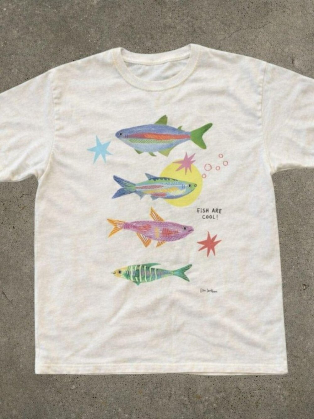 White unisex tee with "Fish are cool" design